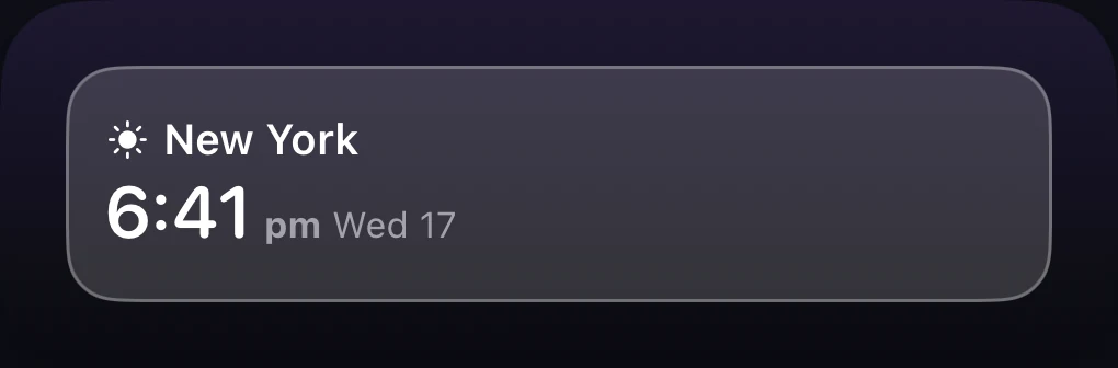 Rectangular Lock Screen time zone widget showing city, local time and date